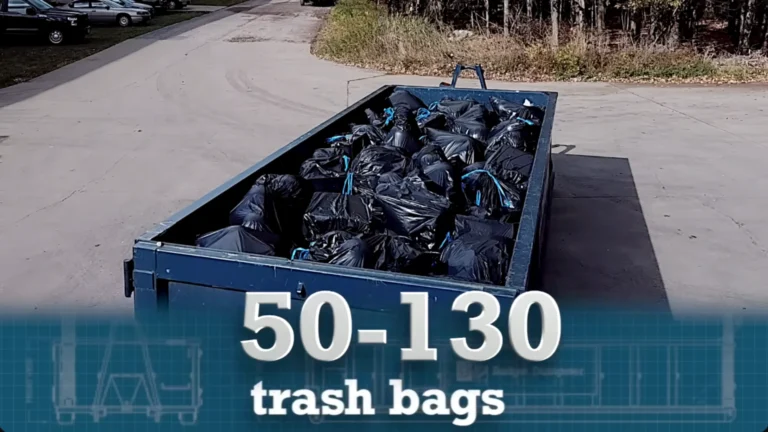 Dumpster holding 50 to 130 trash bags of debris