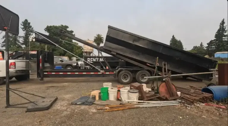 Construction dumpster rental filled with renovation debris in Owensboro, KY