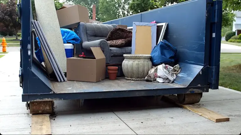 Junk removal crew hauling items in Owensboro, KY
